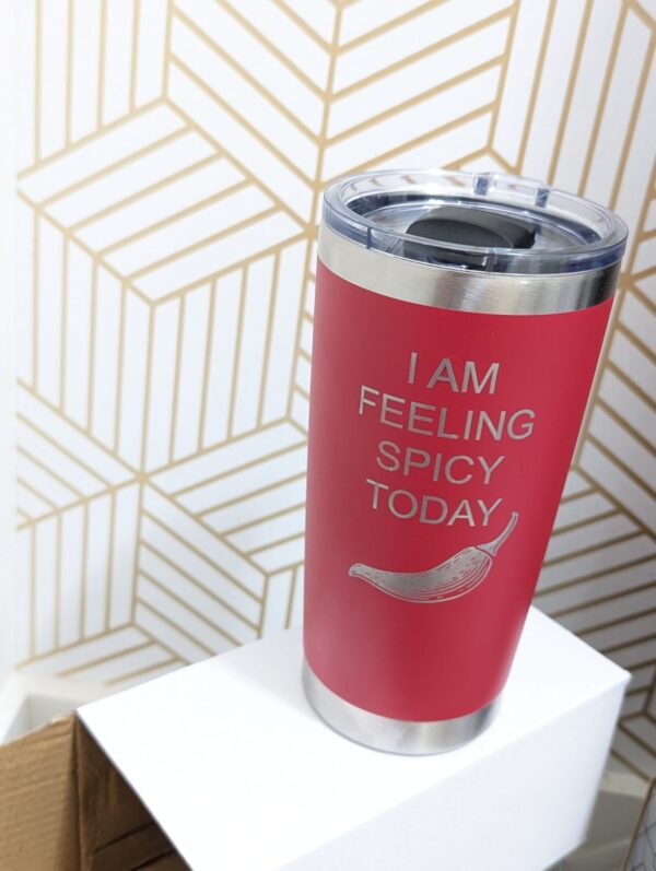 20 oz travel mug branded as CozyBrew Red mug with an engraving "I am Feeling Spicy Today" and a picture of a pepper