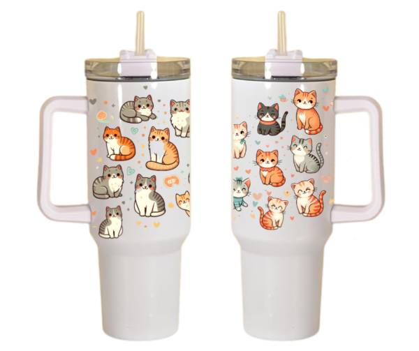 Two white customized 40 oz tumblers like Stanley travel mugs with lids and handles, straws adorned with various cute cat illustrations.