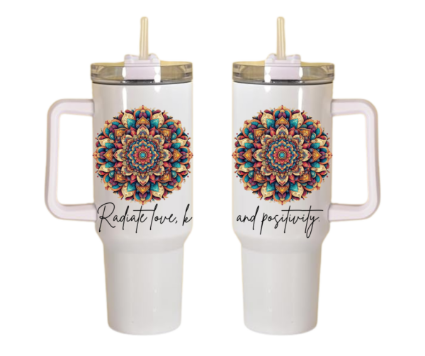 Two white 40 oz tumbler like Stanley travel mugs with colorful mandala designs and inspirational text Radiate love, kindness and positivity.