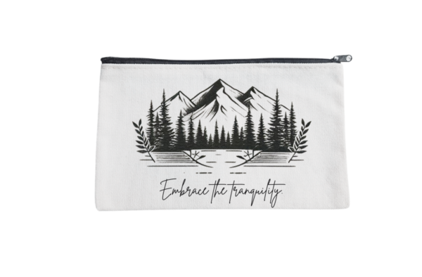 An 8.3x5 inch versatile bag featuring a serene mountain and forest design with the phrase “Embrace the tranquility.”